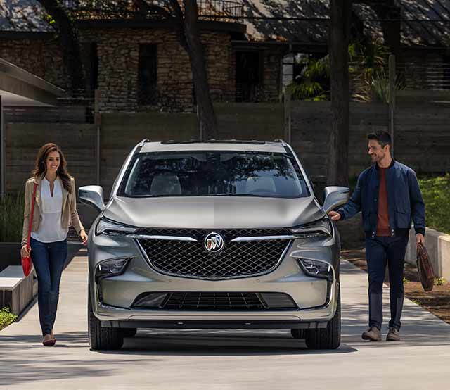 A Couple Prepares to Hit the Town in Their Luxurious Buick SUV