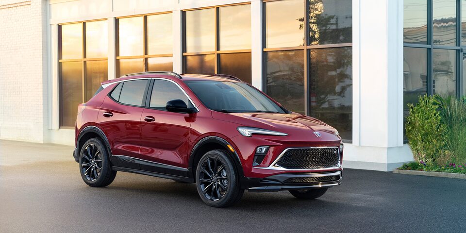 The Buick Encore GX Speeds Over a Bridge in the City