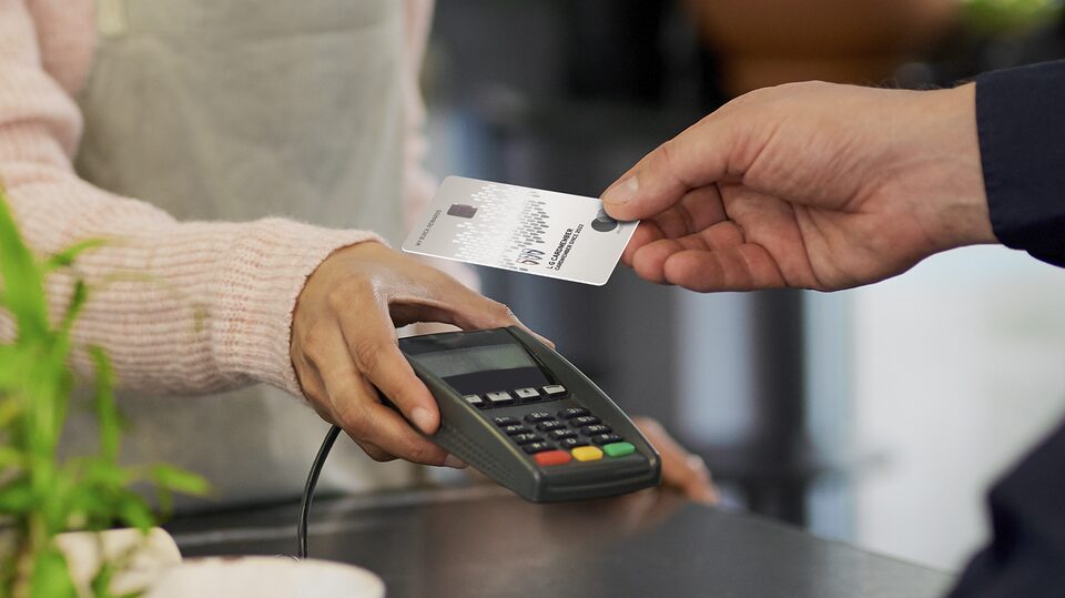 Man Using His My Buick Rewards Card at Coffee Shop to Earn Points