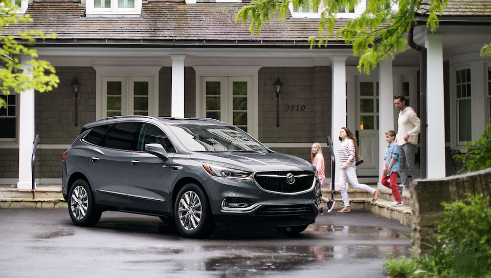 Family Going into Buick Vehicle
