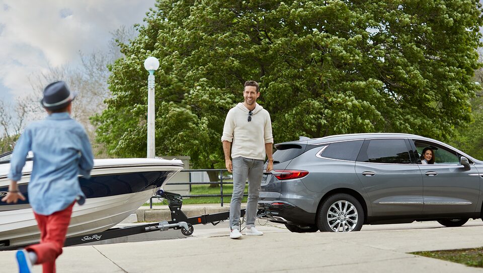 Buick Enclave Trailering Boat at Boat Launch