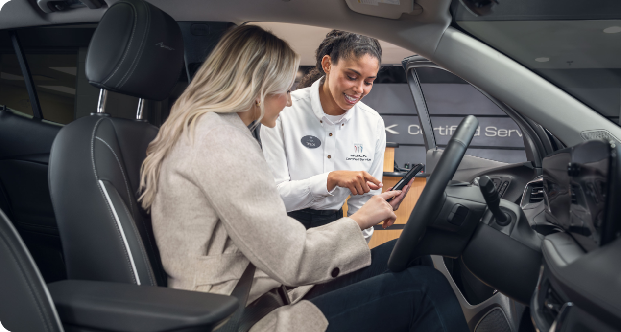 Woman shopping for a new Buick