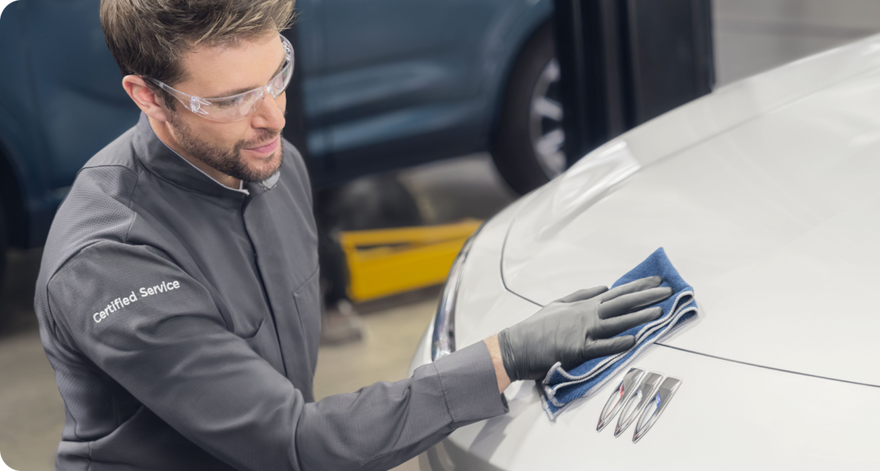 Employee wiping Buick