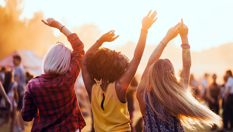Women Dancing at Summer Outdoor Concert Festival When Using My Buick Rewards