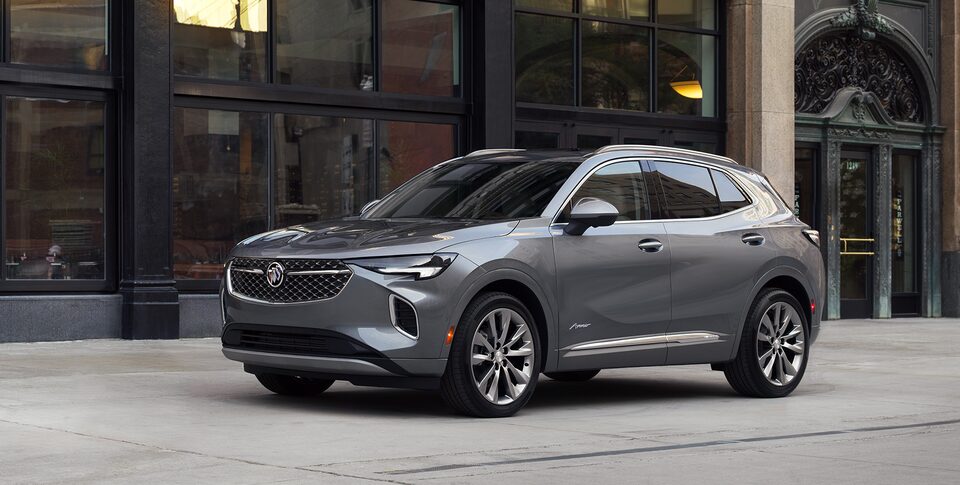 2021 Buick Envision: Compact SUV Three-Quarter Front Passenger Side View On Snow Covered Roads