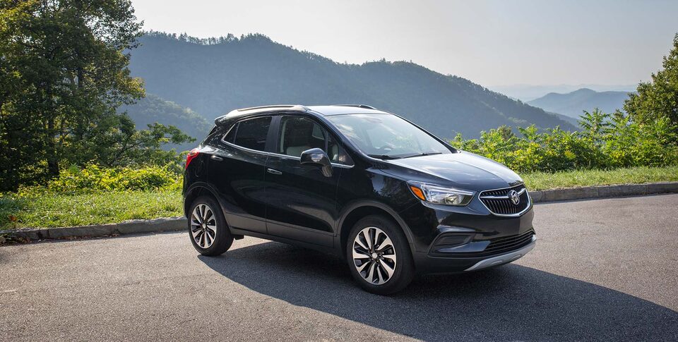 2022 Buick Encore: Small SUV Three-Quarter Front Drivers Side View Parked By Snow Covered Mountains