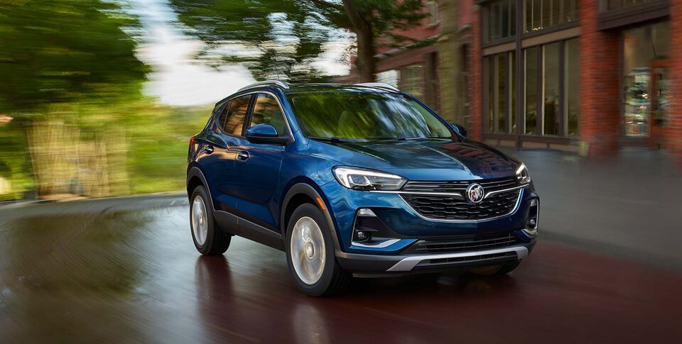 2022 Buick Encore GX: Small SUV Three-Quarter Front Drivers Side View Parked By Snow Covered Mountains