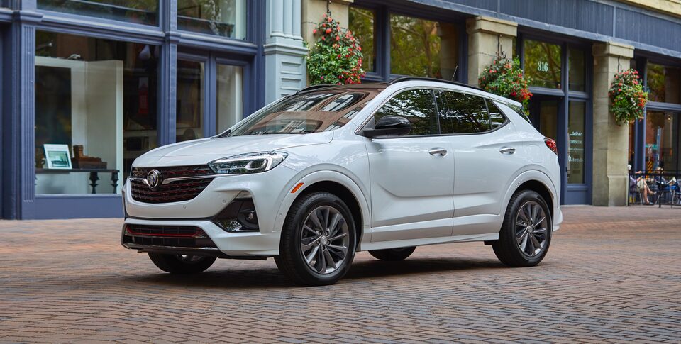2021 Buick Encore: Small SUV Three-Quarter Front Drivers Side View Parked By Snow Covered Mountains