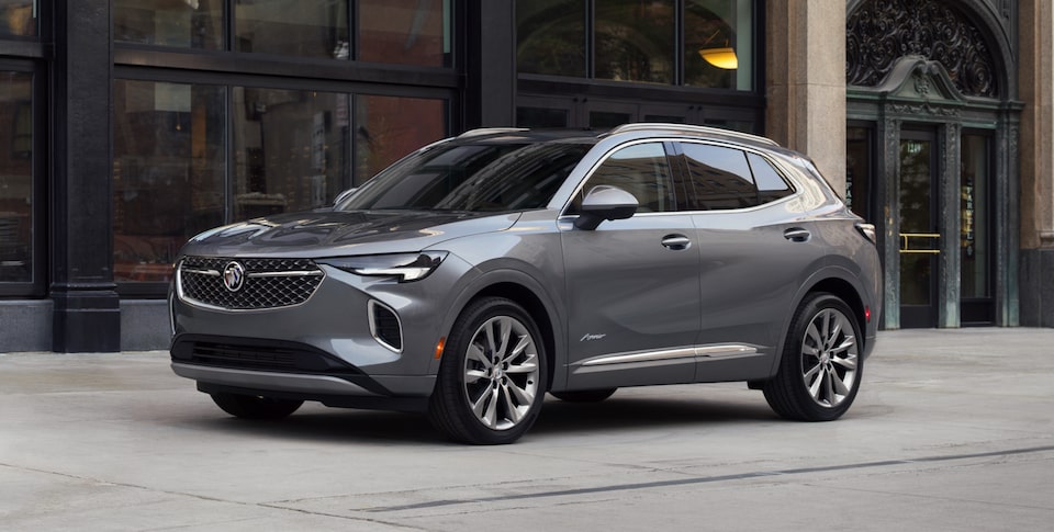 2021 Buick Envision: Compact SUV Three-Quarter Front Passenger Side View On Snow Covered Roads