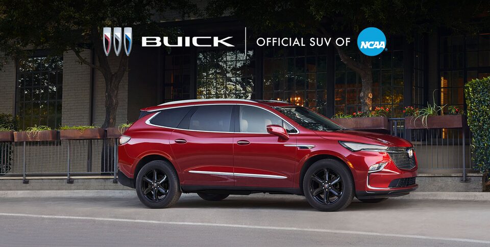 The Buick Enclave ST Parked In a Driveway next to a House