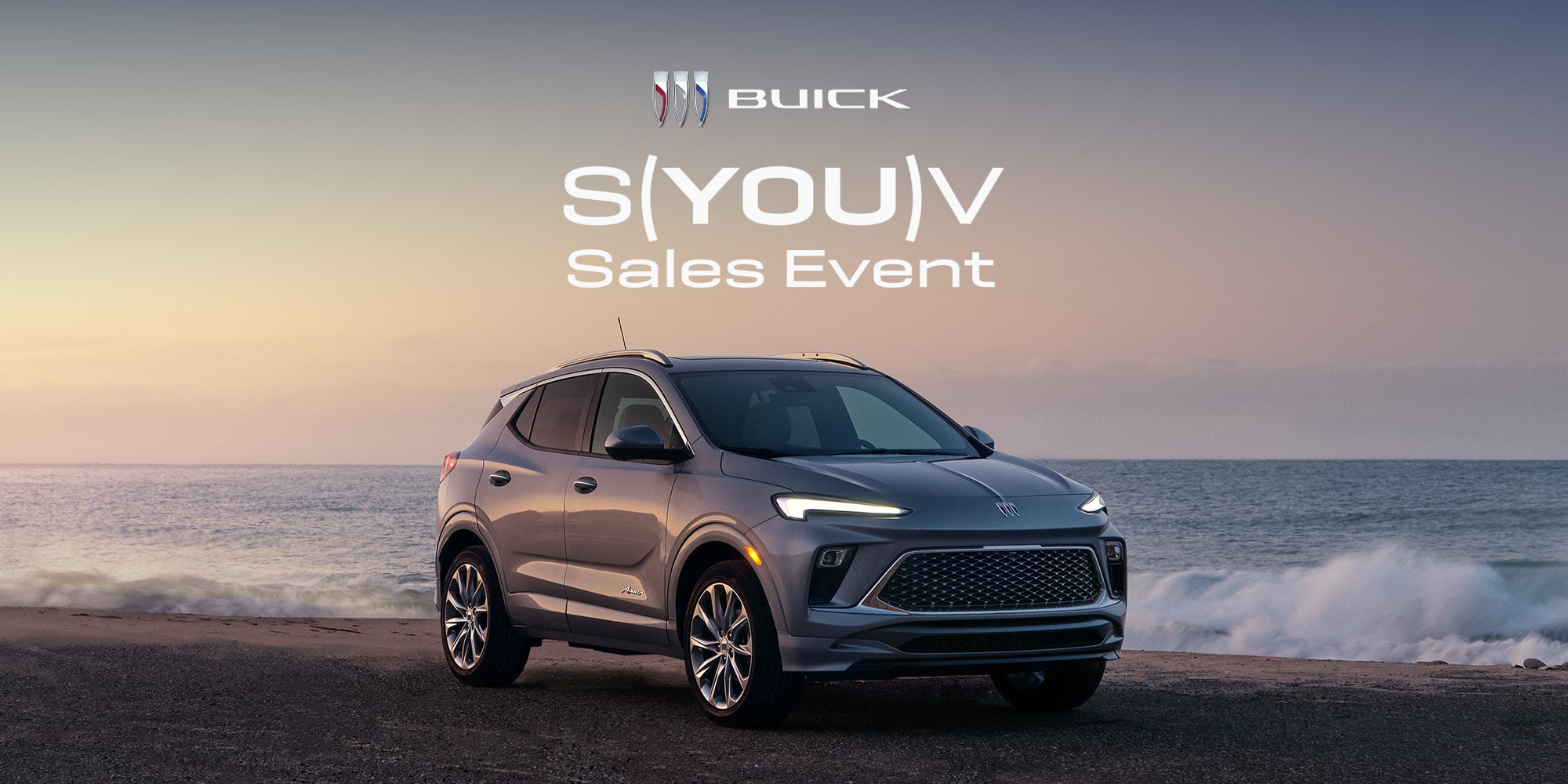 Gray Buick Envcore GX with S(YOU)V Sales Event Logo