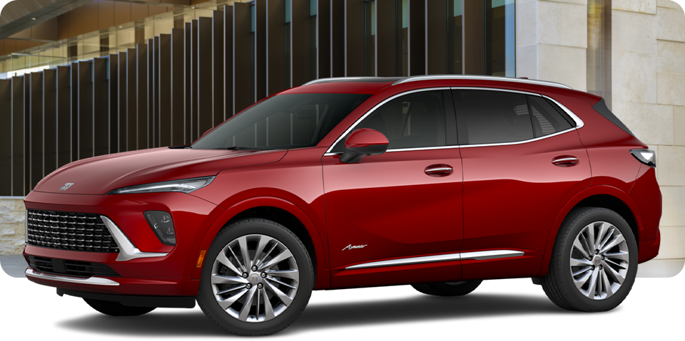 Front-Three Quarter View of a Buick Envision Avenir Luxury SUV Parked Outside a Building