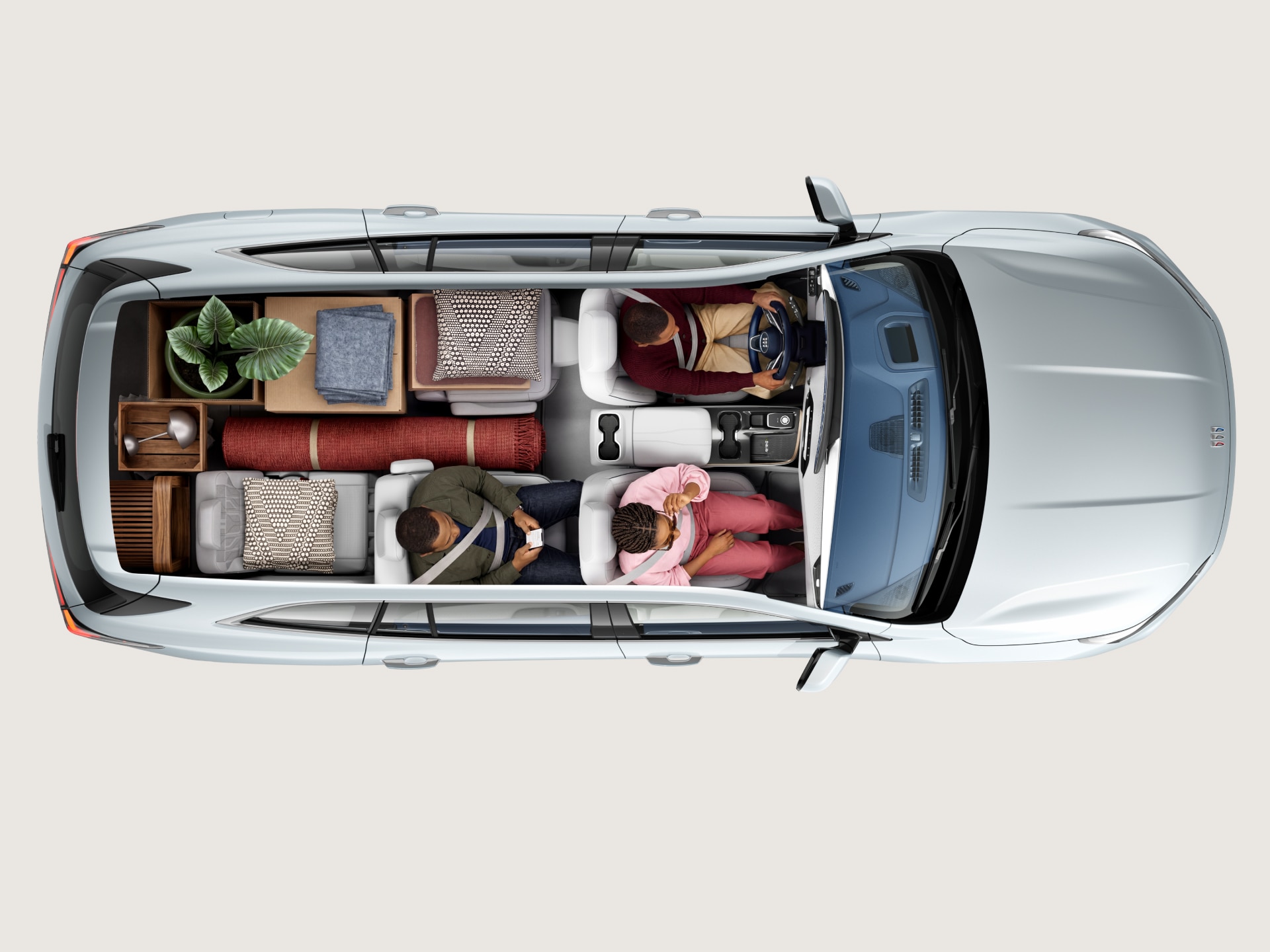 Overhead View of a Gray Buick SUV Interior with Various Cargo Items in the Trunk