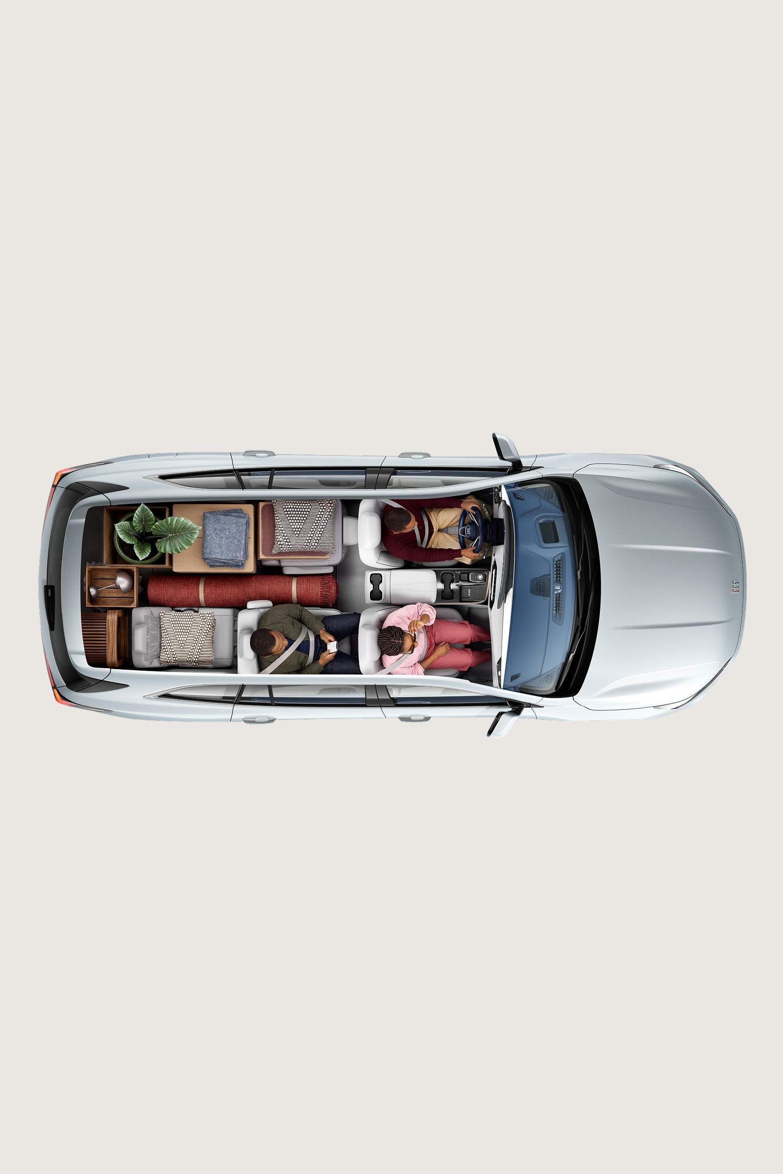 Overhead View of a Gray Buick SUV Interior with Various Cargo Items in the Trunk