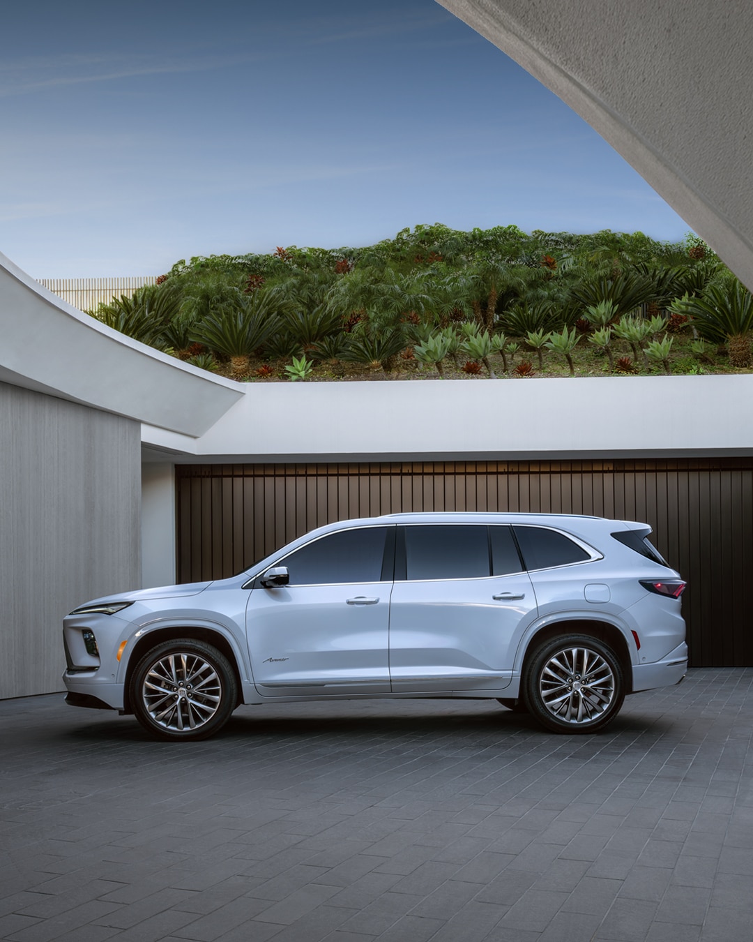 A White Buick Enclave SUV Parked