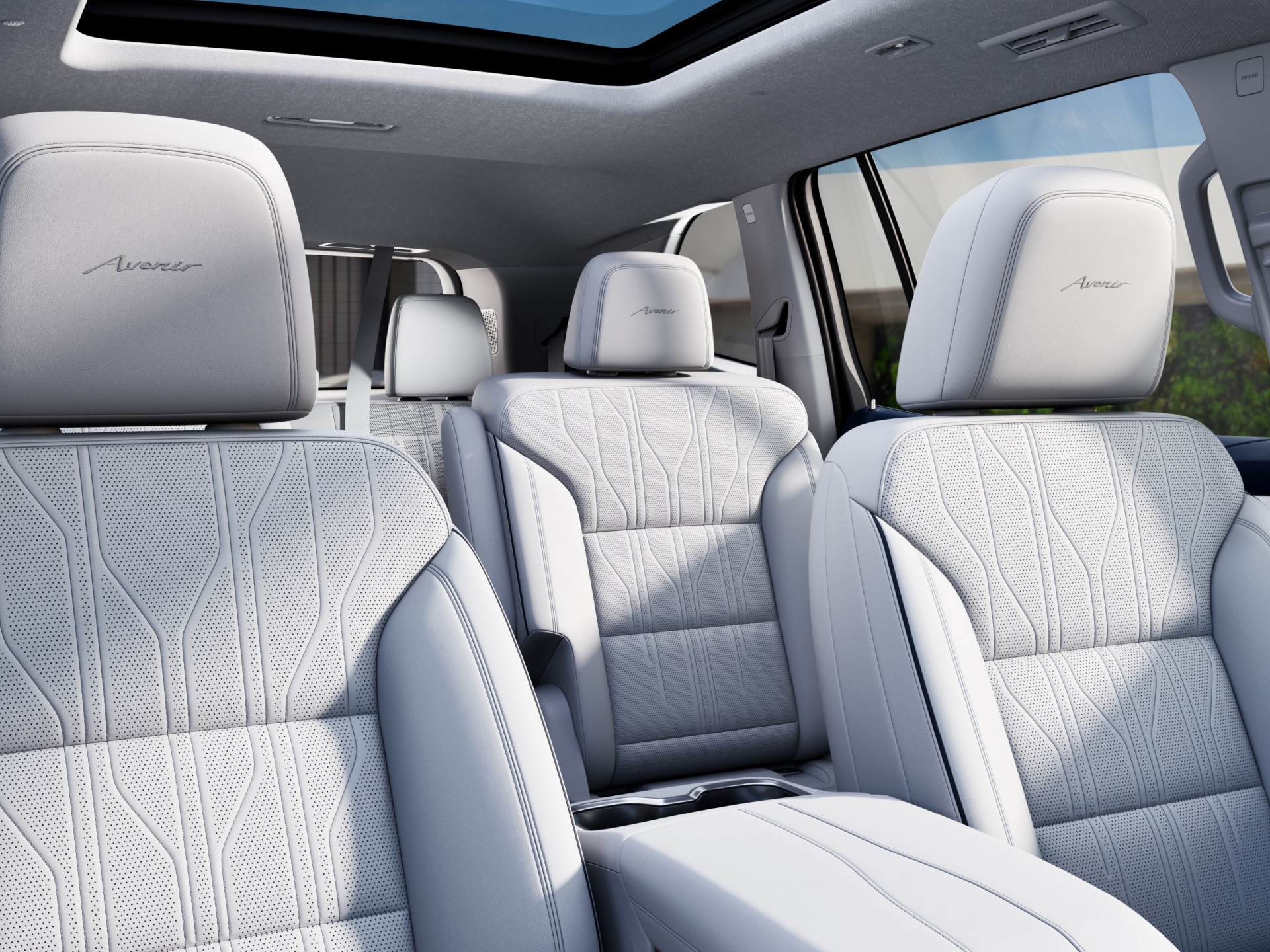 An Interior View of the White Front Seats in a Buick Enclave Avenir
