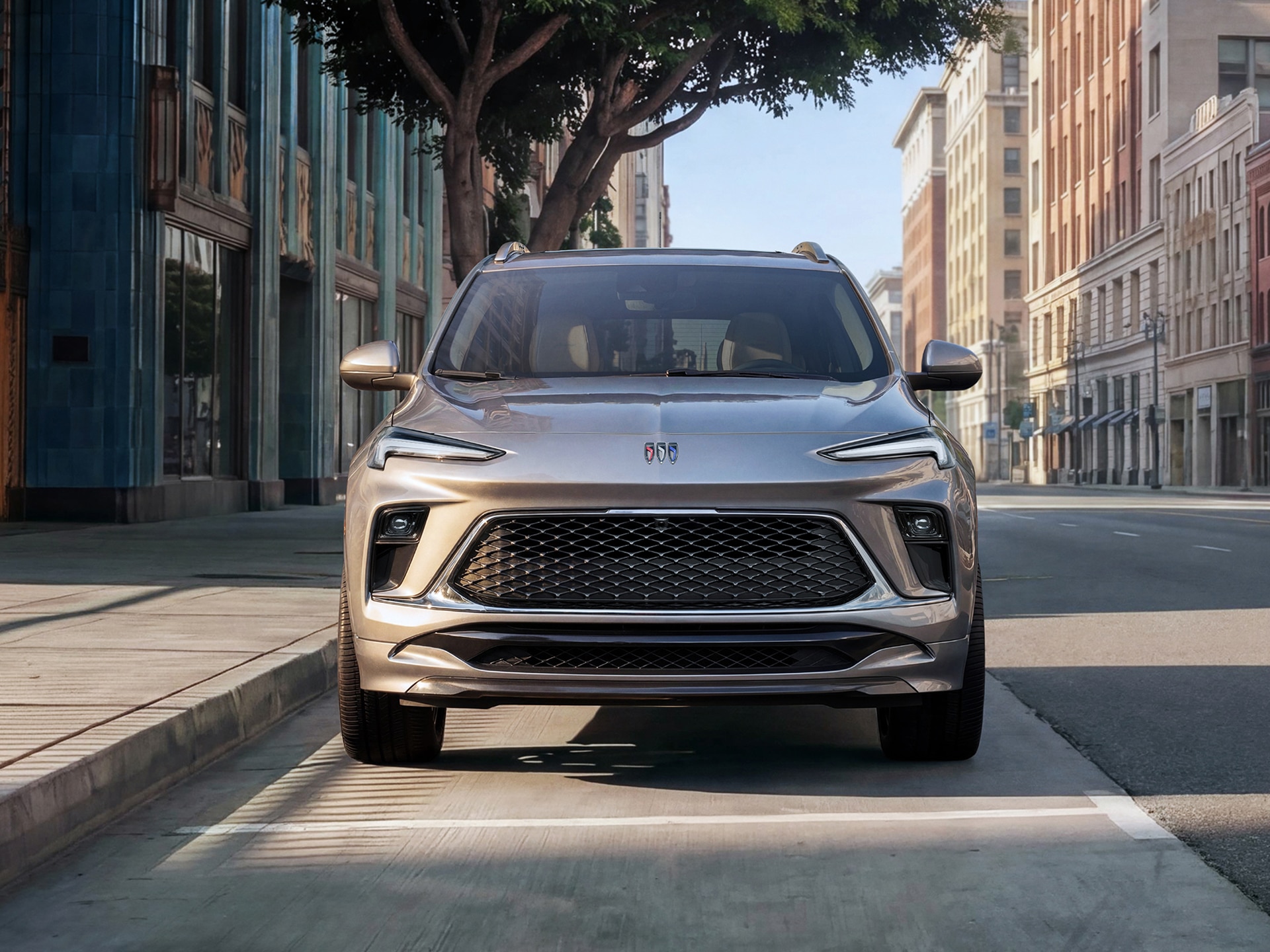 A Gray Buick Encore GX Parked on a City Street in the Middle of the Day