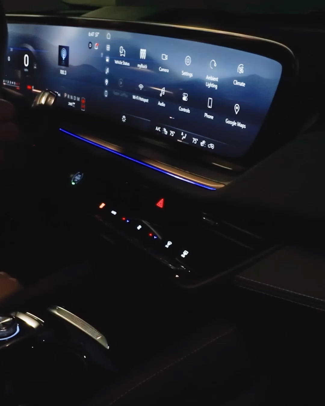 Close-Up of the 2027 Buick Envision Dashboard and Infotainment Screen at Night with Blue Ambient Lighting