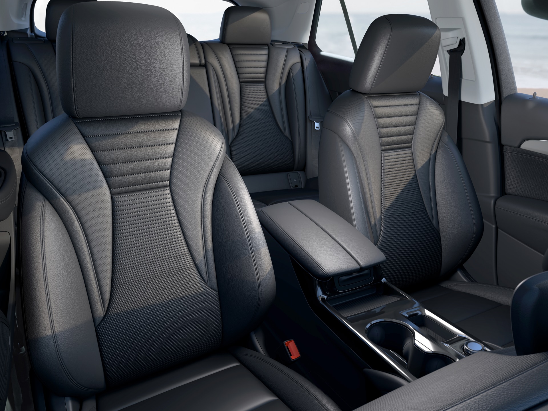 The Interior of a Buick Car Featuring Black Leather Front and Rear Seats with a Detailed Texture