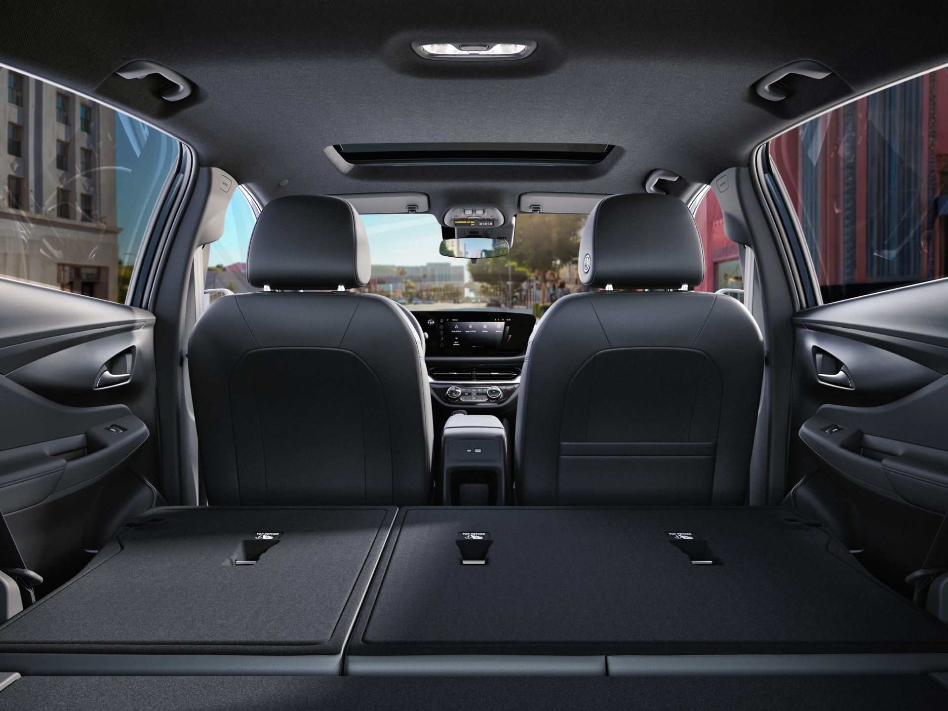 A View from the Cargo Area Showing the Folded Rear Seats of a Buick SUV