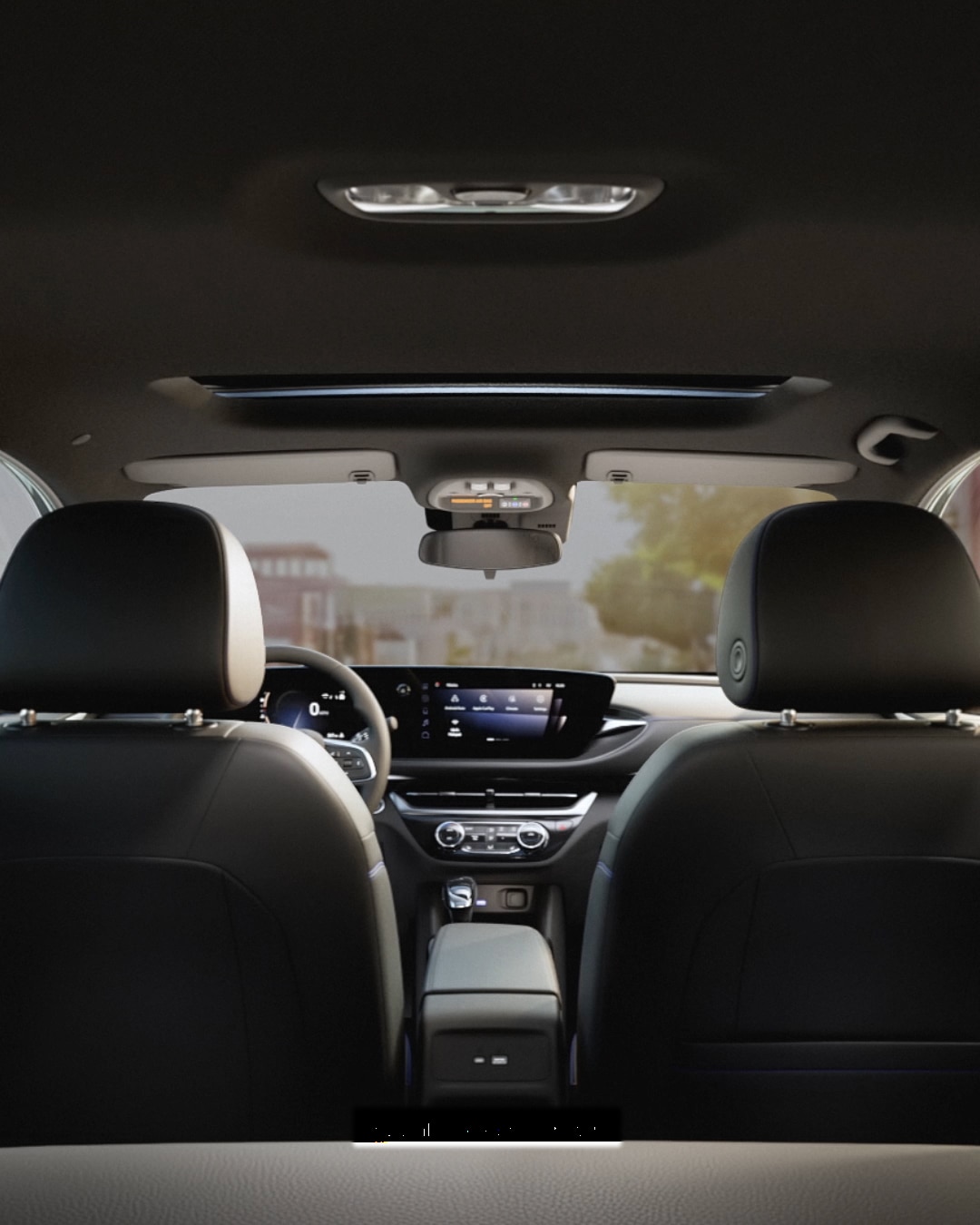 A View from the Rear Seats Looking toward the Front Dashboard of a Buick SUV