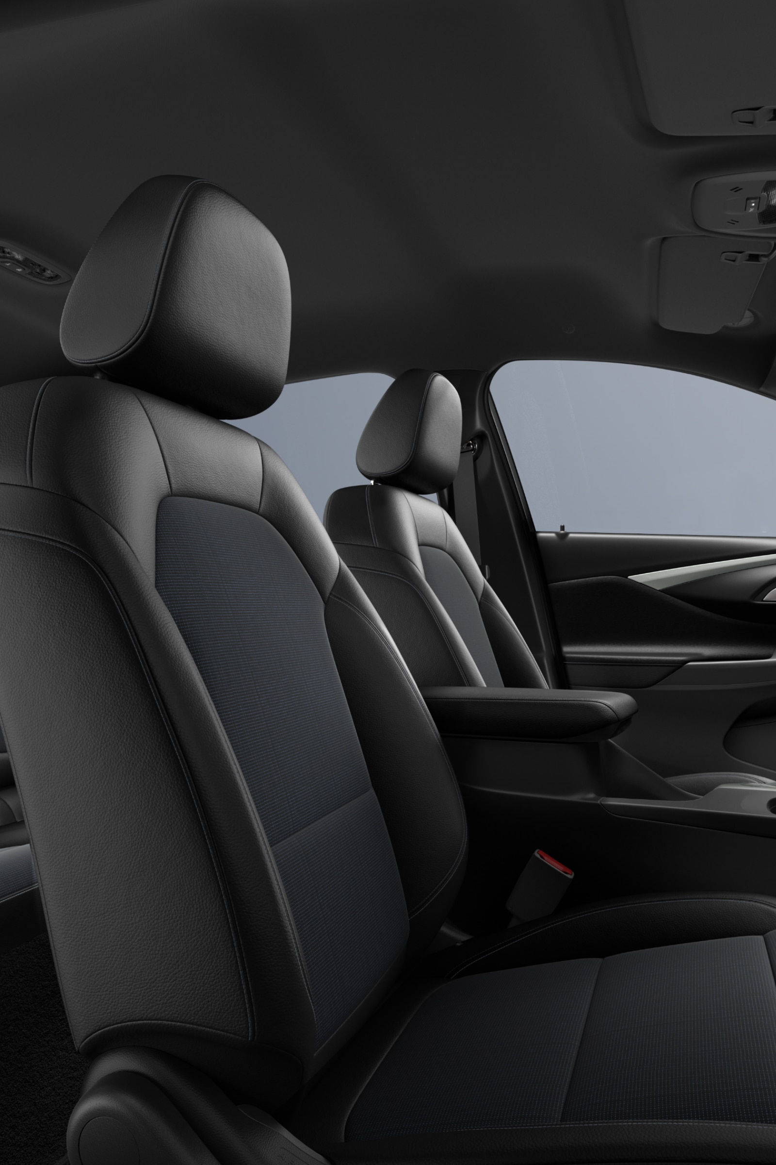 The Interior of a Buick Vehicle Highlighting Black Leather Seats with Blue Fabric Inserts