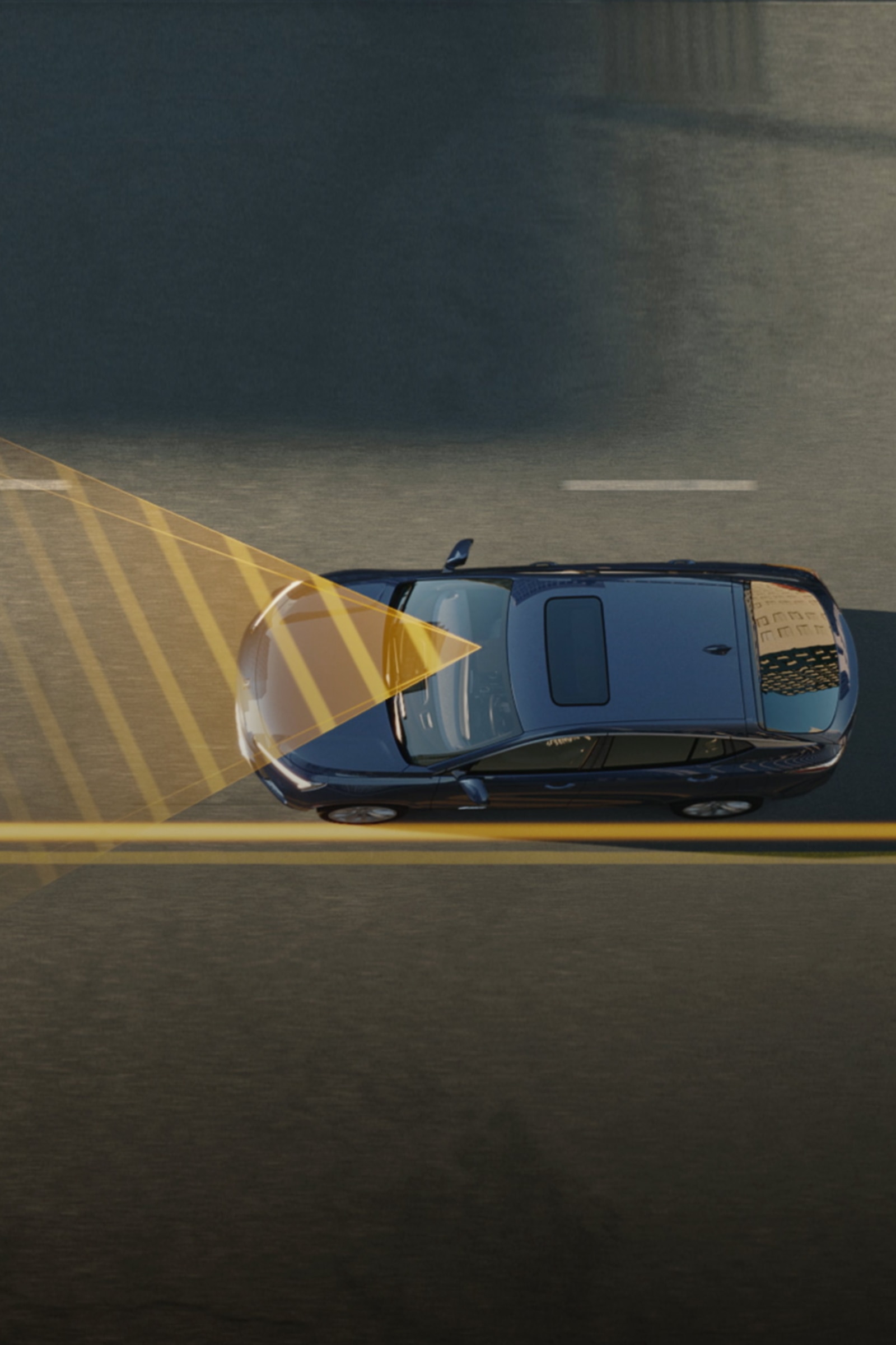 An Aerial View of a Dark Blue Buick SUV Driving on a Road, with Yellow Lines Indicating Safety Features