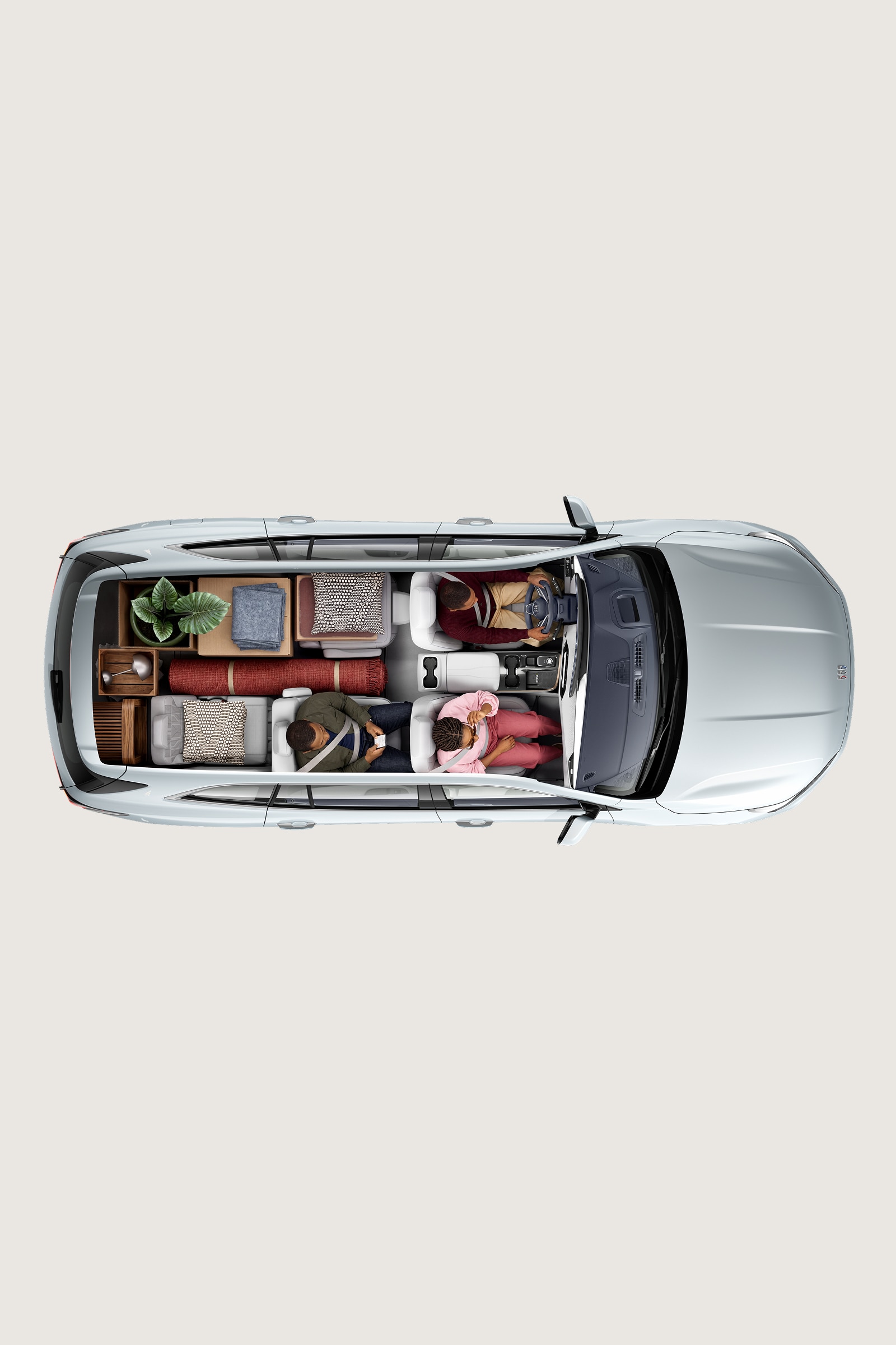 Overhead View of a Gray Buick SUV Interior with Various Cargo Items in the Trunk
