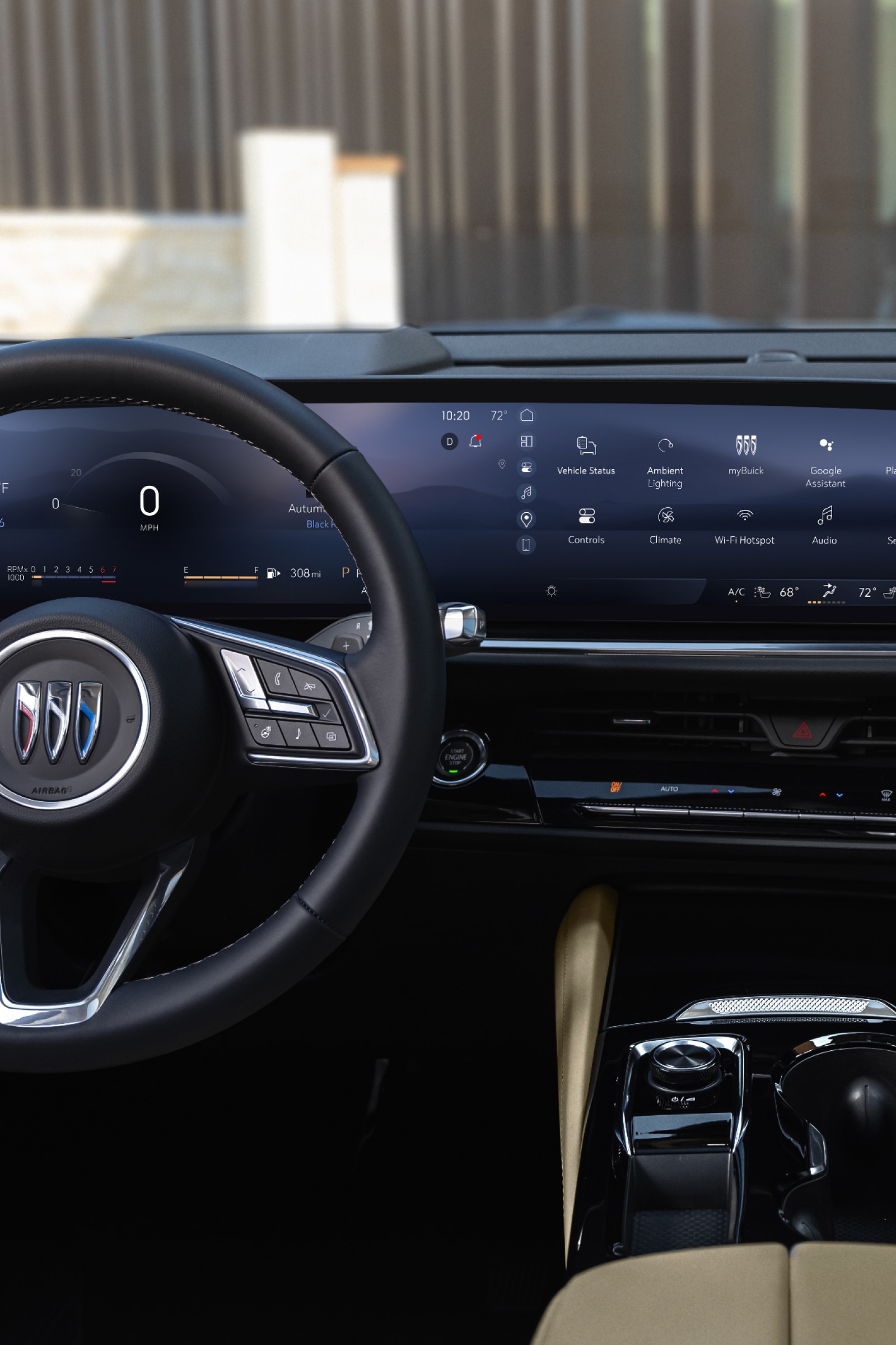 The Interior of a Buick Showcasing its Steering Wheel and Advanced Digital Technology Screen