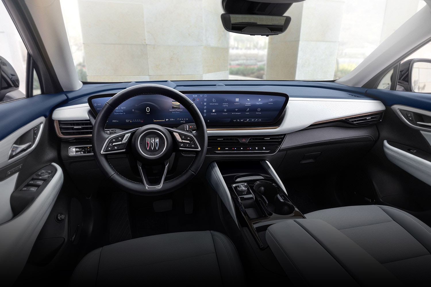 The Luxurious Interior of a Buick Envision Avenir with Blue and White Dashboard and Digital Screens