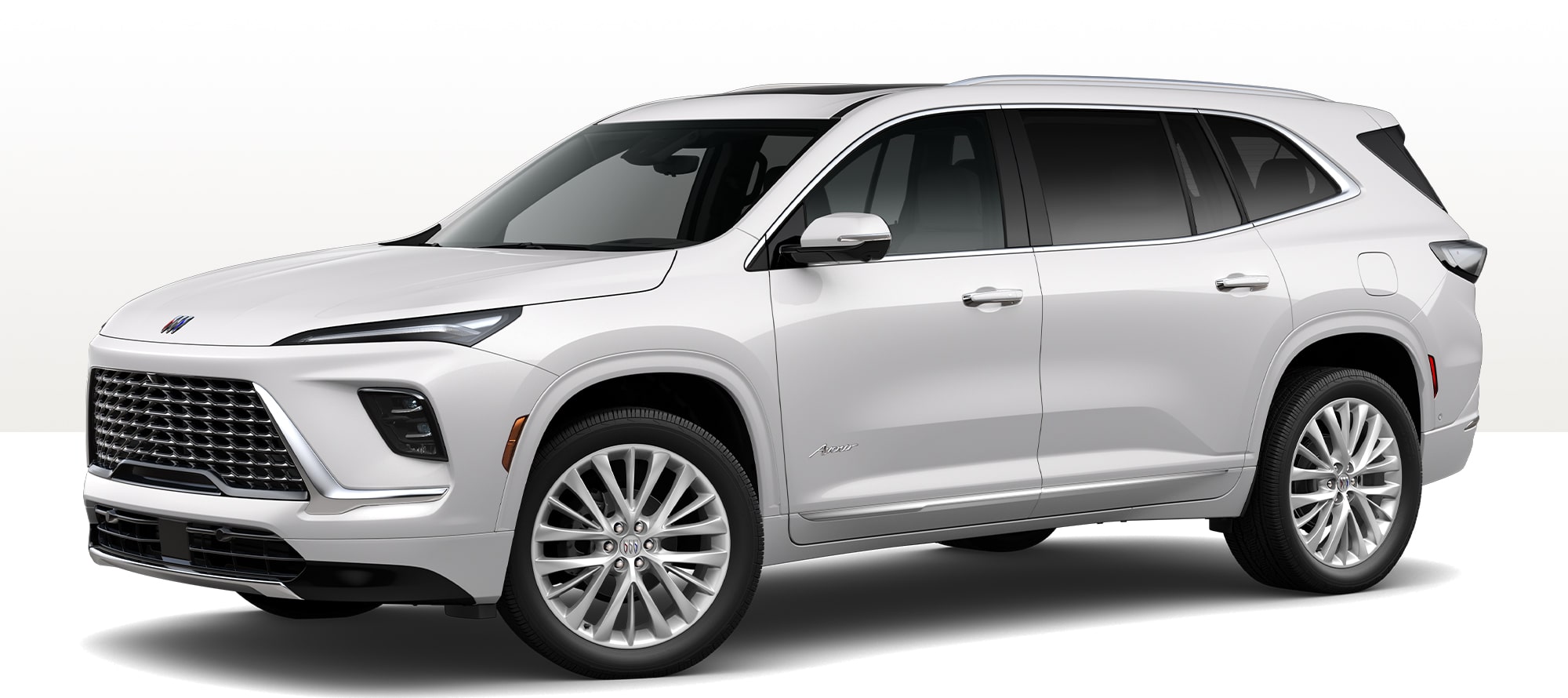 A 2025 Buick Enclave Avenir SUV in White on a Clean Studio Background