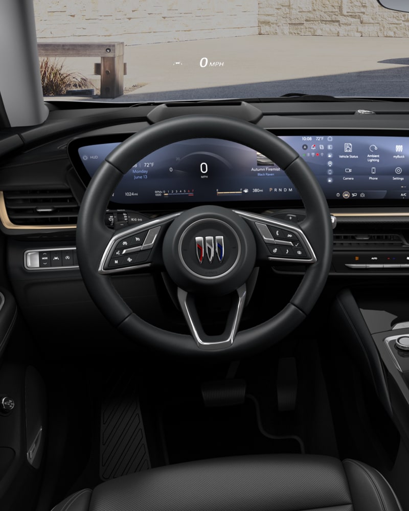 Close-up of the Buick Envision Avenir Interior Drivers Side View of the Steering Wheel and Dashboard