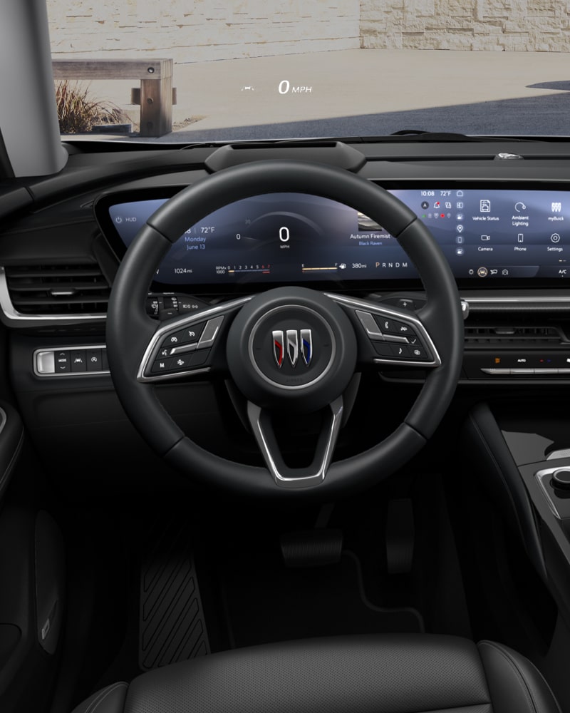 Close-up of the Buick Envision Interior Drivers Side View of the Steering Wheel and Dashboard