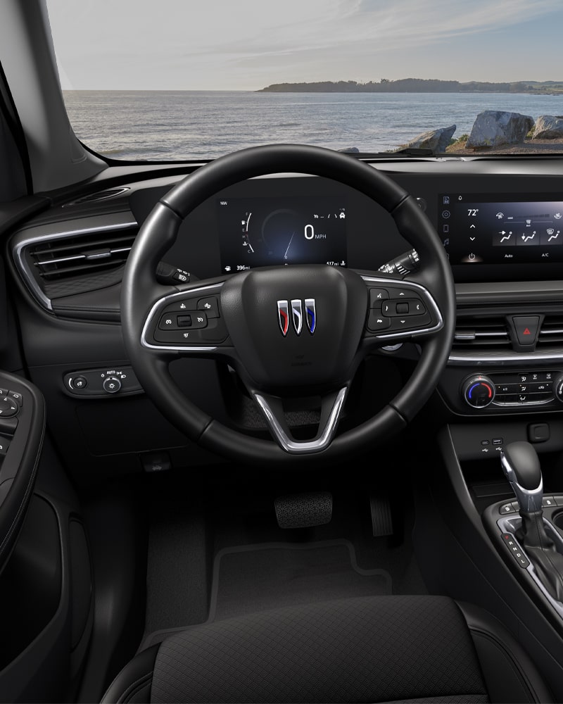 Close-up of the Buick Encore GX Interior Drivers Side View of the Steering Wheel and Dashboard