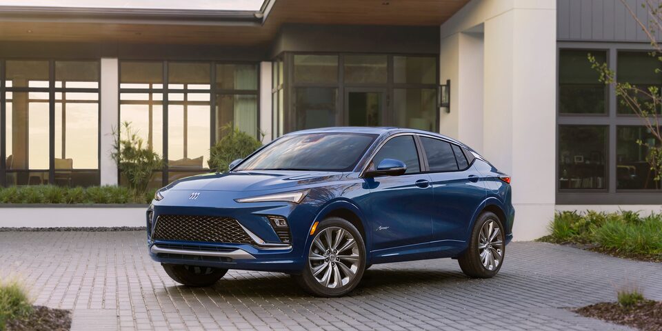The Brand New Buick Envista in Blue Parked in a Driveway