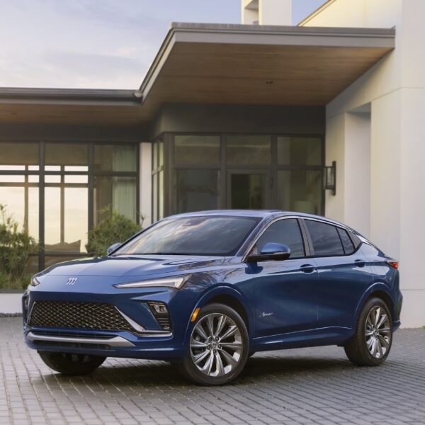 The Brand New Buick Envista in Blue Parked in a Driveway