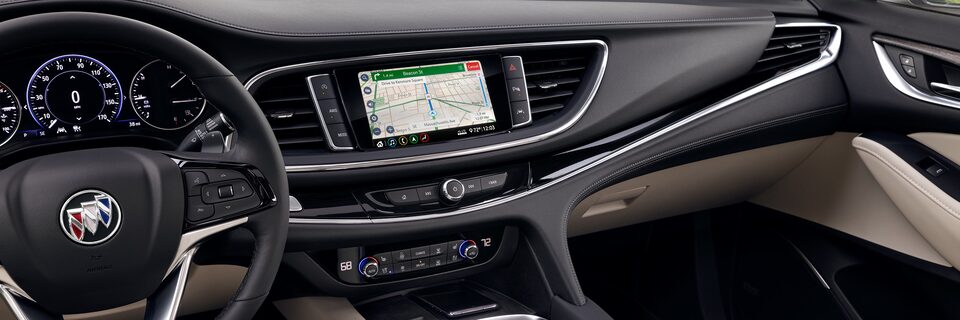 Close-up of the Buick Enclave Interior Infotainment System and Steering Wheel