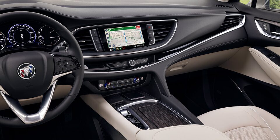 Close-up of the Buick Enclave Interior Infotainment System and Steering Wheel