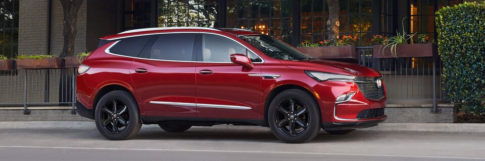 The Red Buick Enclave Parked On-Road
