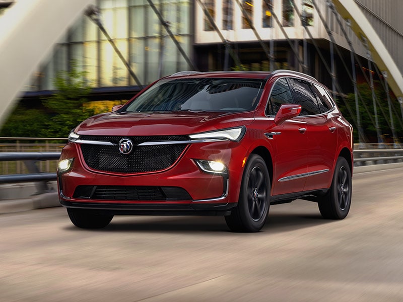The Red Buick Enclave ST Driving on a Bridge