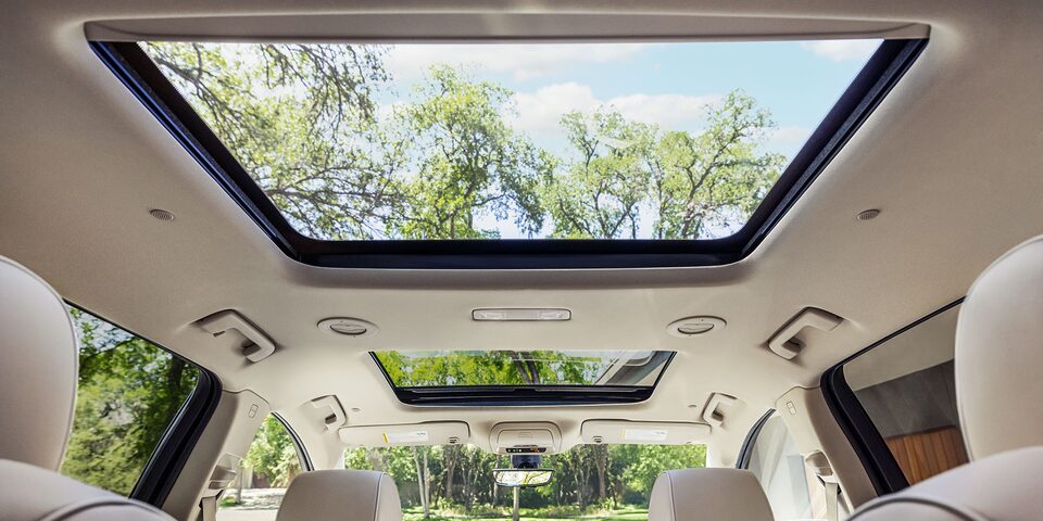 The Massive Panoramic Roof of Buick Enclave Displaying a Beautiful Sunny Day