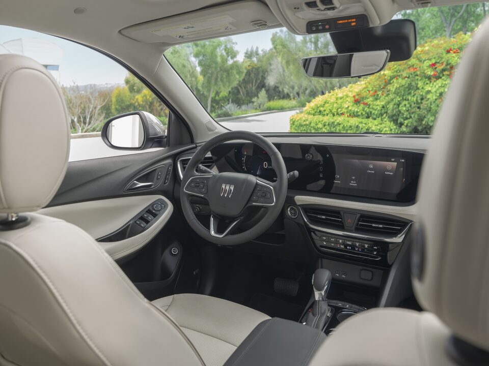 Back Seat View of the Steering Wheel and Infotainment Touch Screen of the Encore GX