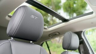 Close-Up on the Stitched Leather Headrest on the Buick Encore GX ST