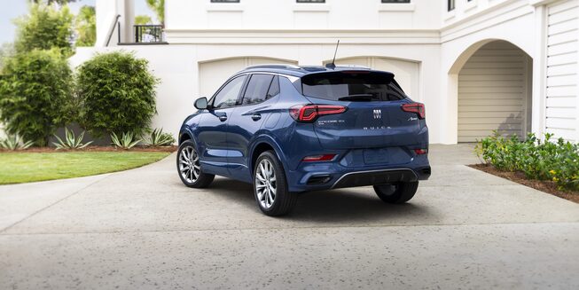 Front End View Of The 2024 Buick Encore GX Avenir In Driveway