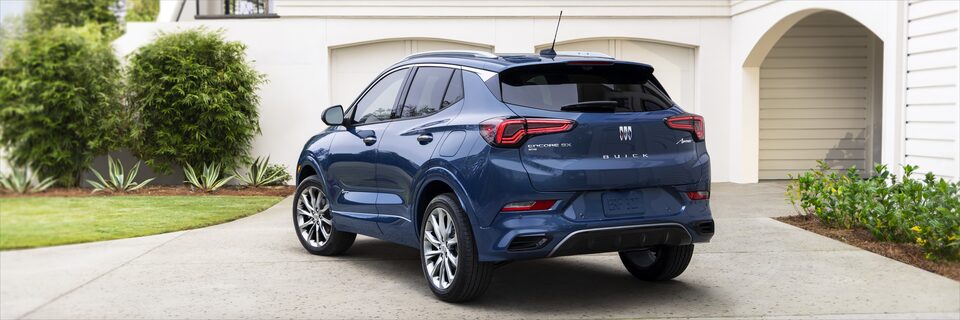 A Side Profile View of the Parked Blue Buick Encore GX