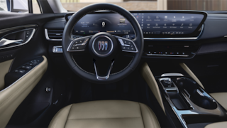 Interior View of the Steering Wheel, Infotainment System and Center Console in a 2024 Buick Envision