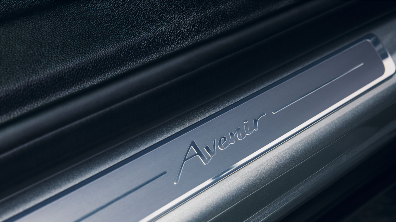 Close-up of Avenir Detail on the Kickplate in a 2024 Buick Envision Avenir