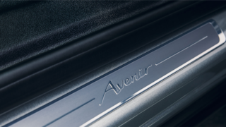 Close-up of Avenir Detail on the Kickplate in a 2024 Buick Envision Avenir