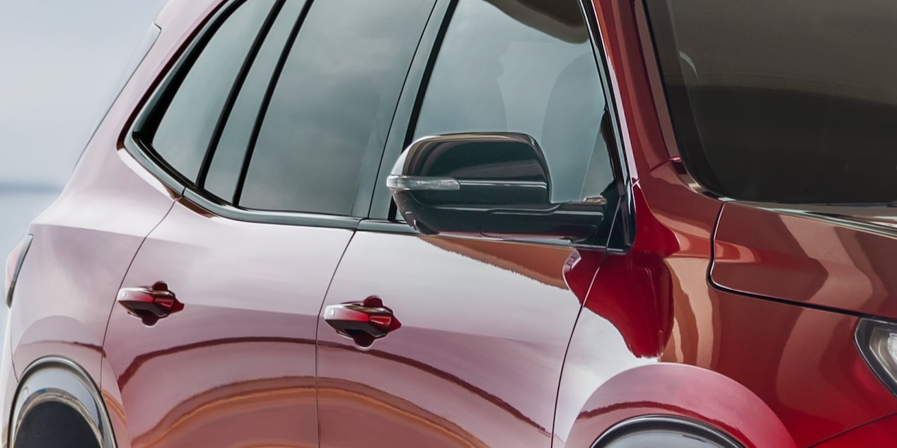 Front Side View of the Passenger Door on the 2025 Red Buick Enclave ST