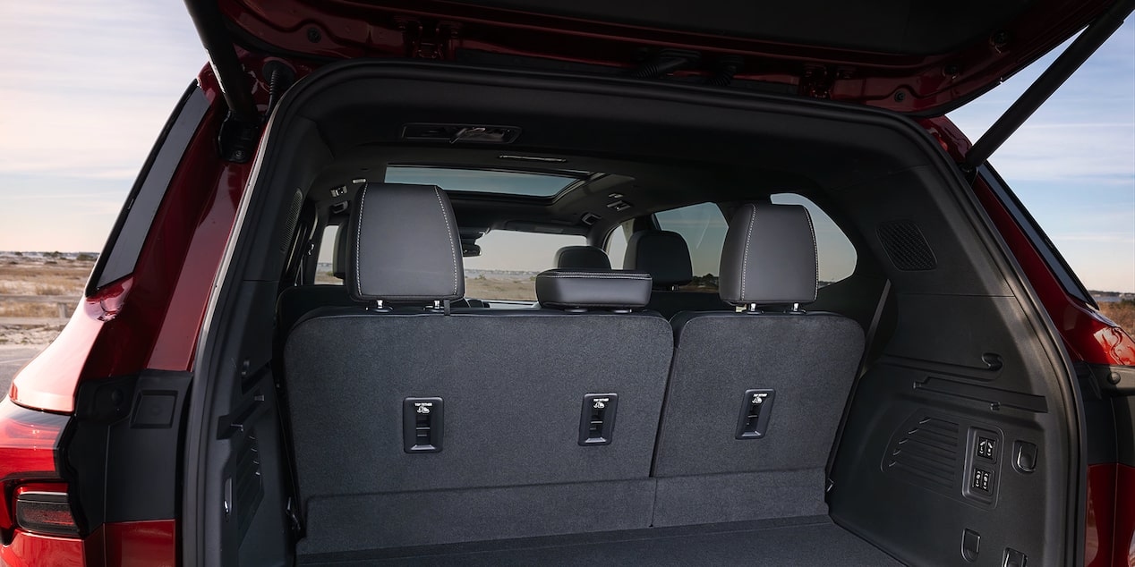 Eye Level View of the Trunk of a 2025 Red Buick Enclave ST